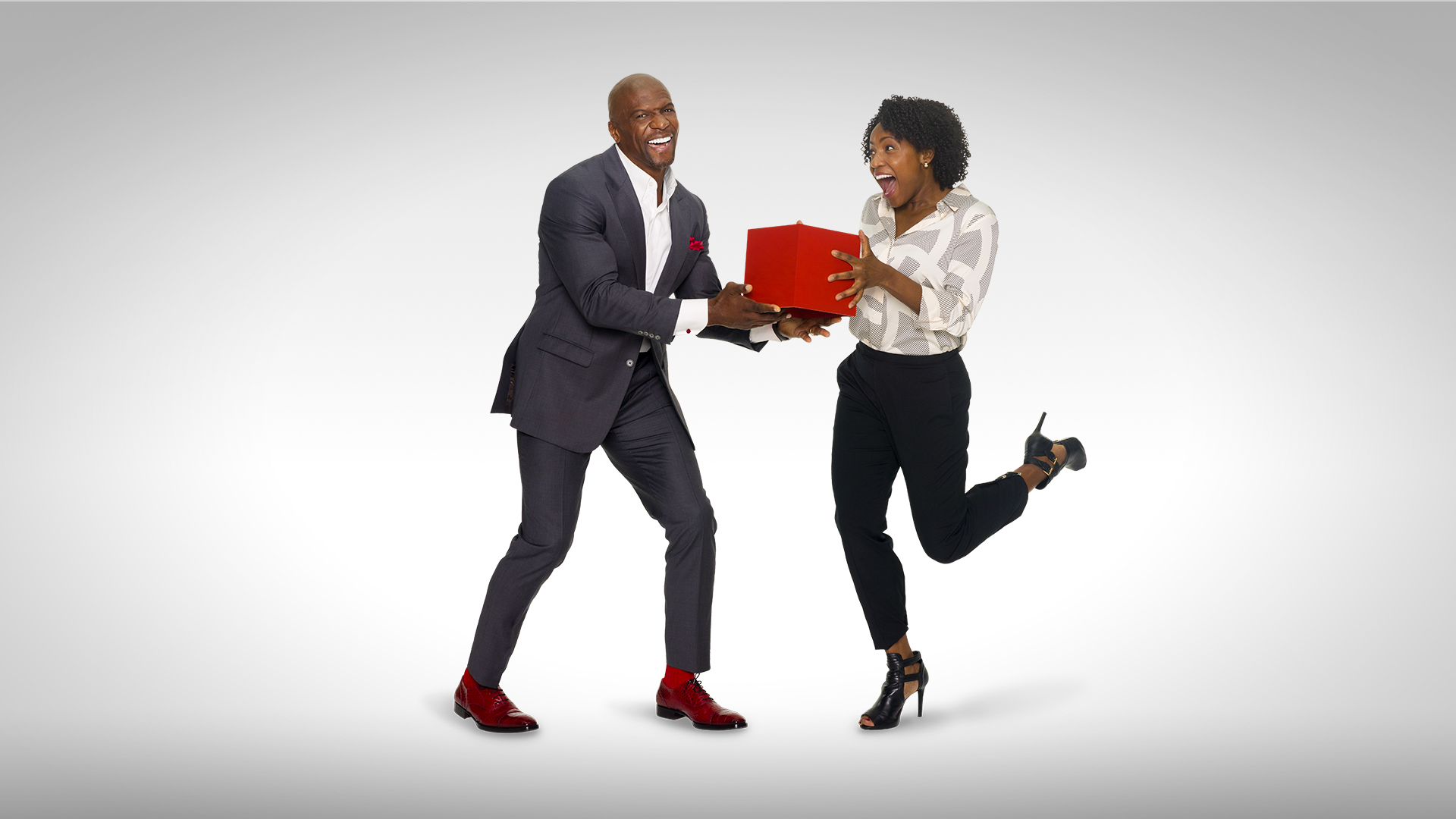 A man and his child sitting indoors